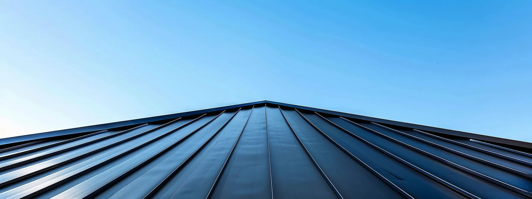 a sleek, modern metal roof shines under a clear blue sky, showcasing its durability and energy efficiency.